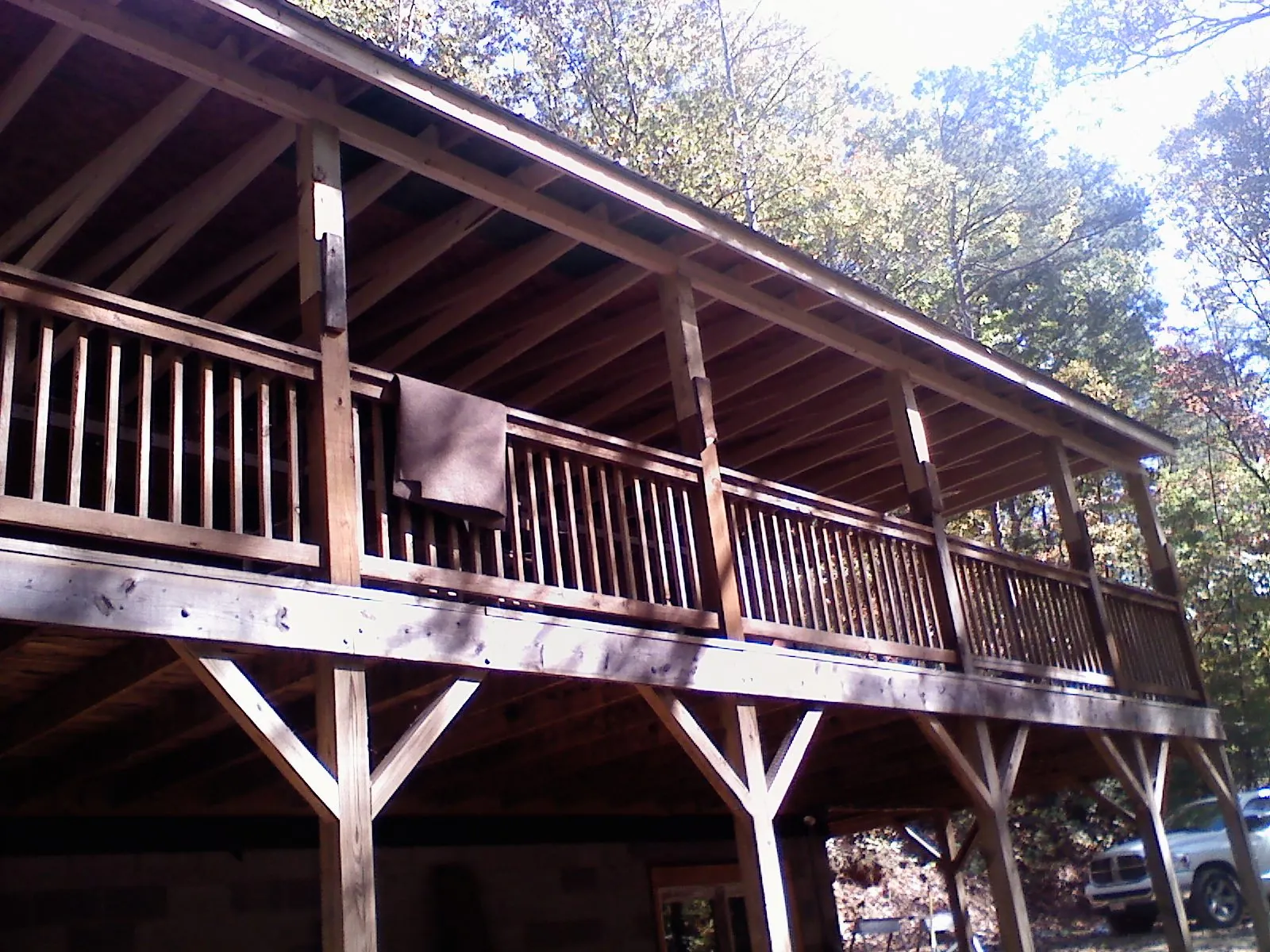 Timber framing under a new elevated porch and deck — Roof Leak Repair in Winnsboro by Roofing Brothers